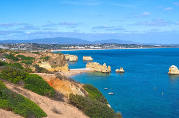 The beauty of Portugal - hiking in Lagos at the blue Atlantic ocean in Portugal