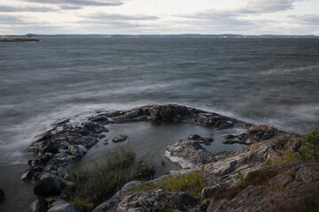 Motion blurred waves on a windy day on the Baltic sea near Nynäshamn, Sweden