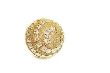 Christmas ball of gold color on a white background