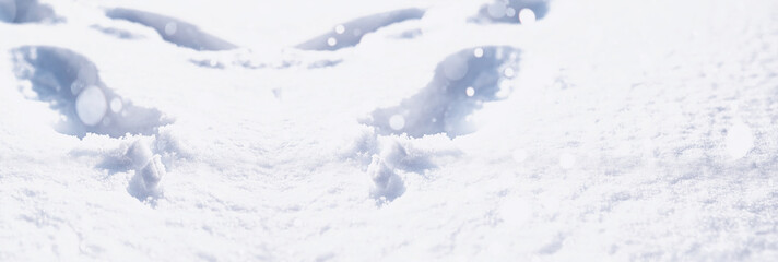Fototapeta na wymiar The texture of the snow. Winter rainfall. Tracks on a snowy road after a snowfall.