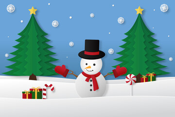 Snowman with gift box in winter snow. Christmas season and Happy new year season