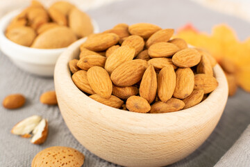 Heap of Raw Almonds on Rustic Background Closeup