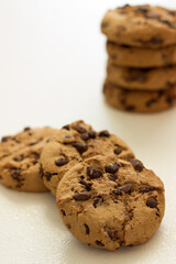 Close up of chocolate chip cookies on white background