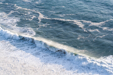 Blue waves on the shore. 