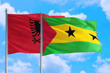 Sao Tome And Principe and Albania national flag waving in the windy deep blue sky. Diplomacy and...