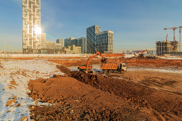 Pile driving in foundation pit. construction of apartment building. Piling driven in ground. Deep...