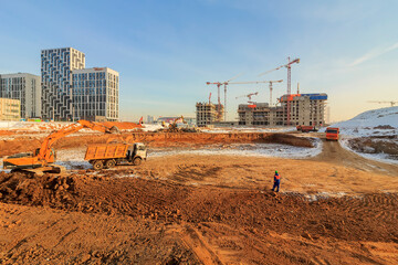Pile driving in foundation pit. construction of apartment building. Piling driven in ground. Deep...