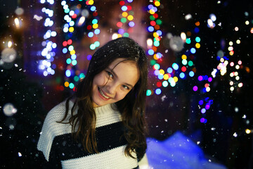 young girl smiling in a winter evening