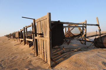 Broken down and defunct diamond sorting panels dating back to the mining days in the Namib desert
