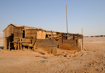 A defunct wooden storeroom dating back to the mining days in the Namib desert