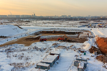 Pile driving in foundation pit. construction of apartment building. Piling driven in ground. Deep...