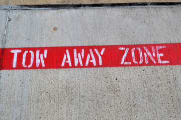 Tow away zone sine on the street, Houston, US