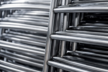 Abstract industrial background of metal pipes construction.