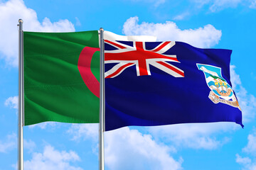 Falkland Islands and Algeria national flag waving in the windy deep blue sky. Diplomacy and international relations concept.