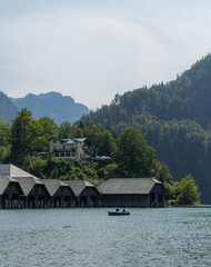 Berchtesgaden boat on lake K&ouml;nigssee with mountains in the background on a sunny summer day