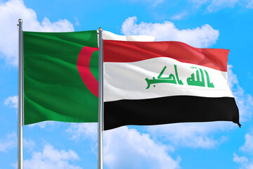 Naklejka premium Iraq and Algeria national flag waving in the windy deep blue sky. Diplomacy and international relations concept.