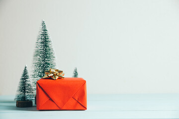 Christmas gift and pine tree. Merry Christmas and happy new year concept.