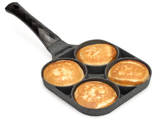 Frying pan for pancakes top view. Cooking pancakes. Isolated on white