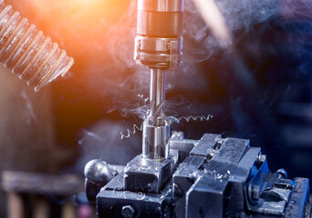 Drilling machine with drill bit for tapping.