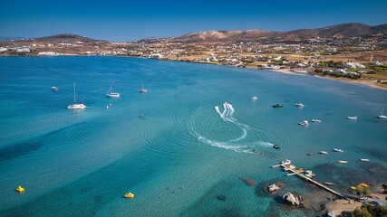 Aerial drone of sandy beach sea water Paros island Cyclades, Greece