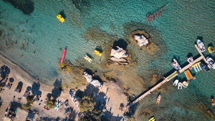 Aerial drone of sandy beach sea water Paros island Cyclades, Greece
