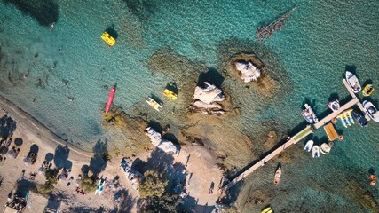 Aerial drone of sandy beach sea water Paros island Cyclades, Greece