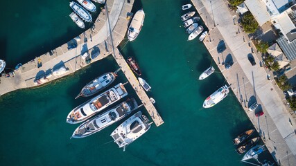 Fototapeta na wymiar Aerial view of the pier with Paros island on a Naousa village