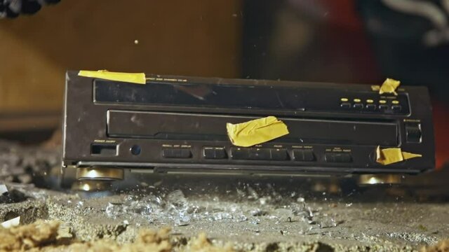Rendering useless some old casette player in slow motion