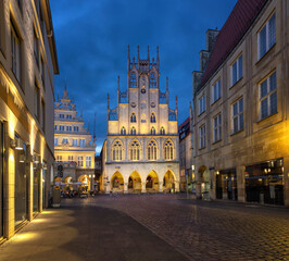Fototapeta na wymiar Munster, Germany. Historical City Hall at dusk