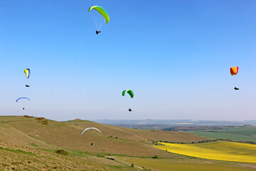 Paragliders flying at Milk Hill, Wiltshire	