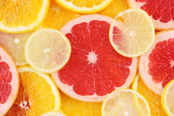 Fototapeta premium Background from citrus fruits. Bright fruit