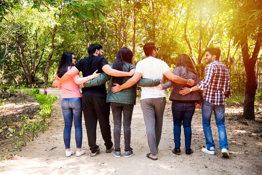 Group Of Indian Asian People Or Young College Friends Having Fun Outdoors