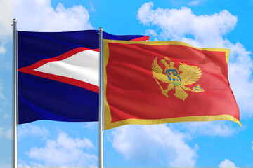 Montenegro and American Samoa national flag waving in the windy deep blue sky. Diplomacy and international relations concept.