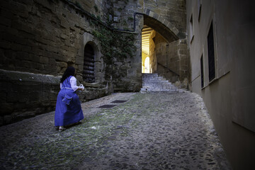 Woman walking through town