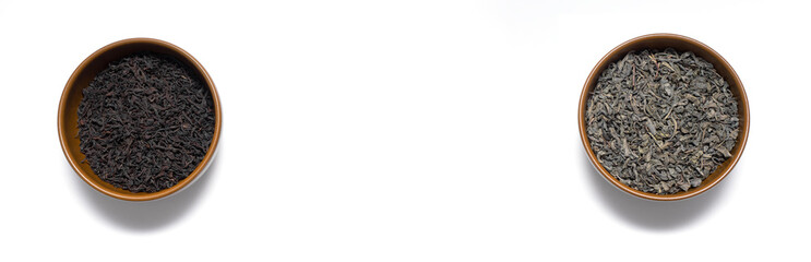 Green and black tea leaves in brown plates. Place for text. Copy space. Banner