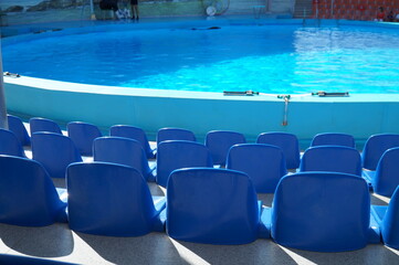 Naklejka premium Seats in front of the pool.