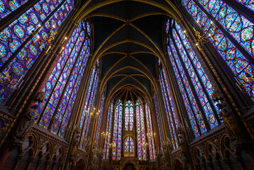 Fototapeta na wymiar The interior upper level of Sainte-Chapelle, the Gothic royal chapel on the Ile de la Cite in Paris France, highlighting it's stained glass windows