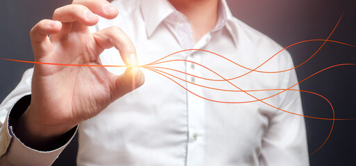 Man aligns branched lines into a single straight. Solving problems and conflicts. Settle things up....