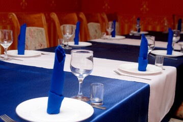 Dining table with blue tablecloth