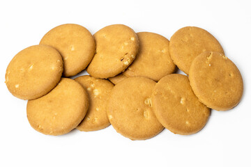 Delicious crispy rounded wheat biscuits decorated on a white background