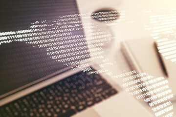 Double exposure of digital America map on laptop background, research and strategy concept