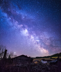 Milky way core over a village in Slovakia © Mrio