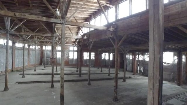 Drone video of empty big warehouse. Real time drone video of a warehouse.