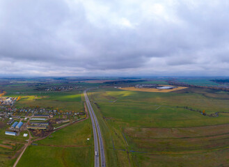 Aerial bird-eye view on freeway in autumn season