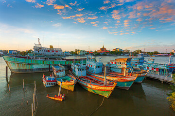 Many boats moored in sunrise morning time at Chalong port, Main port for travel ship to krabi and...