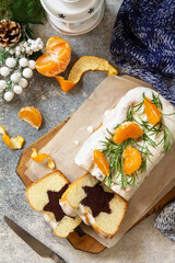 Winter dessert. Christmas chocolate star cupcake with sour cream frosting on the festive table. Top view flat lay background.