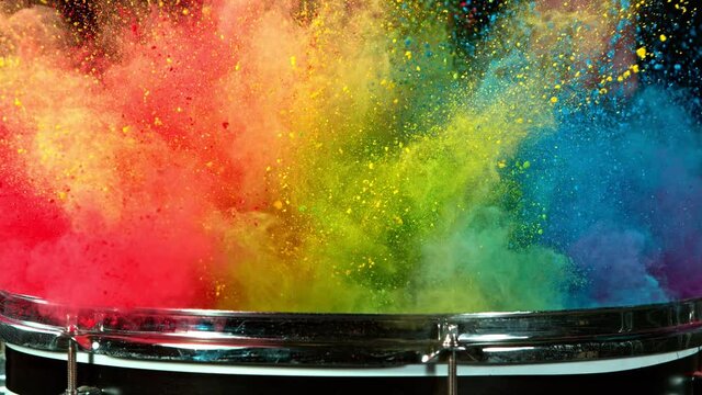 Super Slow Motion Shot of Drum Hit with Color Powder Explosion at 1000 fps.