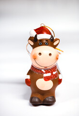 Christmas tree toy Bull symbol of the new year 2021. Chinese New year 2021 year of the Bull, on a white background. Selective focus