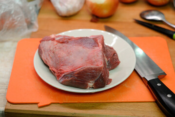 raw meat and knife