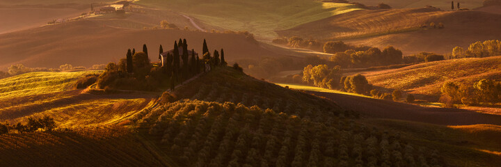 Tuscan hills at sunrise. Typical rural landscape. Tuscany, Italy